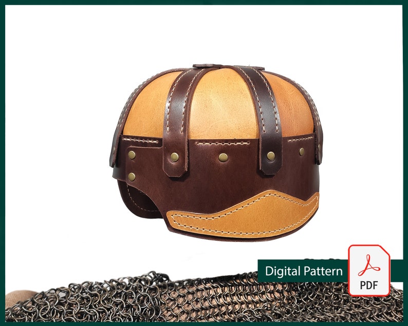May include: A brown leather helmet with a tan leather top and stitching. The helmet has a rounded shape and is decorated with rivets. The helmet is a digital pattern for crafting.