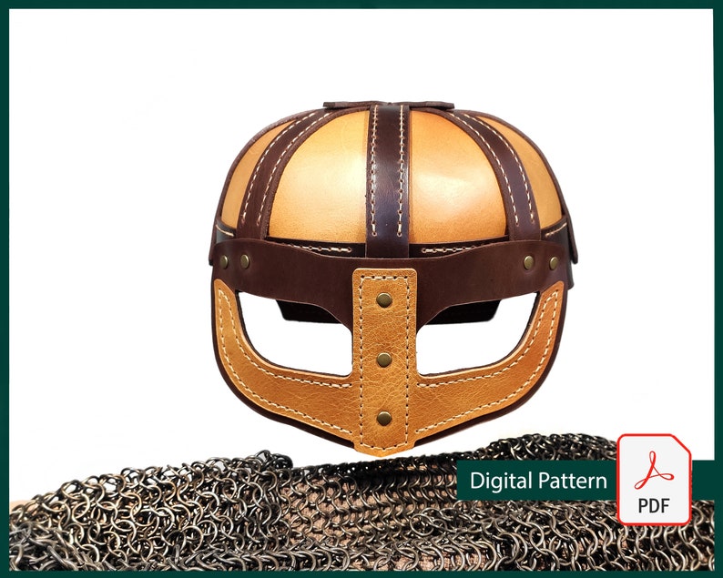 May include: A brown leather helmet with a tan leather top and a stitched design. The helmet has a face mask with a cut-out for the eyes. The helmet is on a background of chainmail.