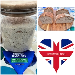May include: A clear glass jar with a bamboo lid containing active sourdough starter, next to four slices of baked bread on a wooden board, and a blue package labelled Brown Basmati Wholegrain Brown Basmati Rice Gluten Free with a heart-shaped UK flag.