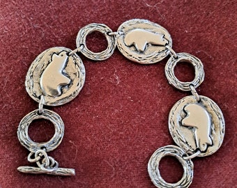 Bracelet ours polaire stylisé en étain, forme médaillons ronds sur chaîne, 19,5 millimètres, bijou de créateur, vintage à létat neuf