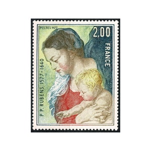 Peut inclure: Un timbre-poste français vintage représentant une peinture d'une mère et de son enfant. Le timbre est vert, bleu et rouge avec le texte "2,000 FRANCE" imprimé dessus.