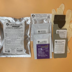 May include: A lace frontal customization kit with bleach powder, creme developer, neutralizing shampoo, purple toning shampoo, and a gold corrector plus. The kit also includes a pair of gloves and a brush.