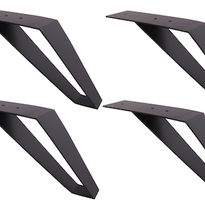 May include: Set of four black metal table legs with a triangular shape. Each leg has three mounting holes.