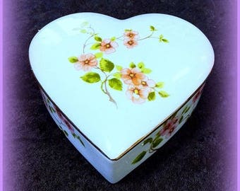 Heart-shaped jewel box patterned flowers and gold on blue Limoges porcelain
