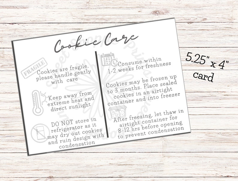 May include: A white card with black text and icons provides instructions for storing and consuming cookies. The card measures 5.25 inches by 4 inches and includes the text "Cookie Care" in a decorative font. The instructions include information about handling the cookies gently, storing them away from heat and direct sunlight, and freezing them for up to 3 months.