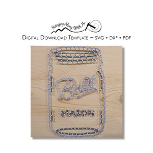 May include: A string art project of a Ball Mason jar on a wooden background. The jar is outlined with nails and string.