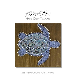 May include: A string art turtle design in shades of blue and green, mounted on a wooden board. The turtle is outlined with white nails and string, with the text "Stringing Along With Me" and "HARD COPY TEMPLATE" at the top.