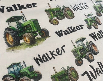 May include: White fabric with a repeating pattern of green and black tractors and the word "Walker".