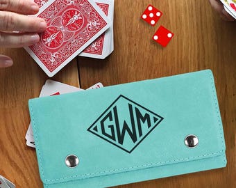 Engraved game case with cards and dice