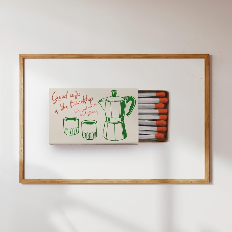 May include: A matchbox with a green and white illustration of a coffee pot and two cups. The text on the matchbox reads "Good coffee is like friendship - rich and warm and strong".