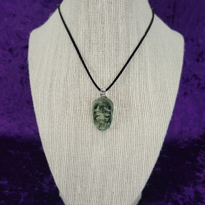 Metallic Green Glass Skull Necklace