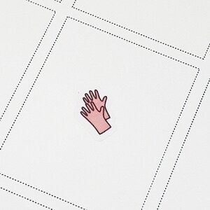 Peut inclure: Une paire de gants en caoutchouc rose avec un contour blanc, sur un fond blanc.