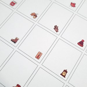 May include: A white sheet of paper with a grid of squares. Each square contains a small, colorful illustration of a fall-themed item, such as a jar of jam, a leaf, a mitten, a boot, an acorn, a thermometer, a lantern, and a beanie.