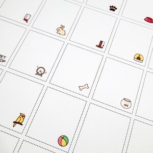 以下が含まれることがあります： 正方形のグリッドが描かれた白い紙。各正方形には、骨、金魚鉢、足跡、鳥、ボール、ウサギ、猫の爪とぎ、犬小屋、時計、フードボウルなど、ペットに関連する異なるアイコンが描かれています。