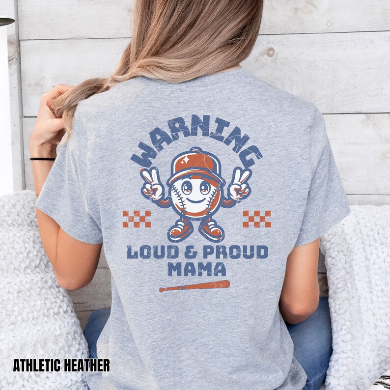 May include: Gray t-shirt with a distressed baseball graphic and the text "WARNING LOUD & PROUD MAMA".