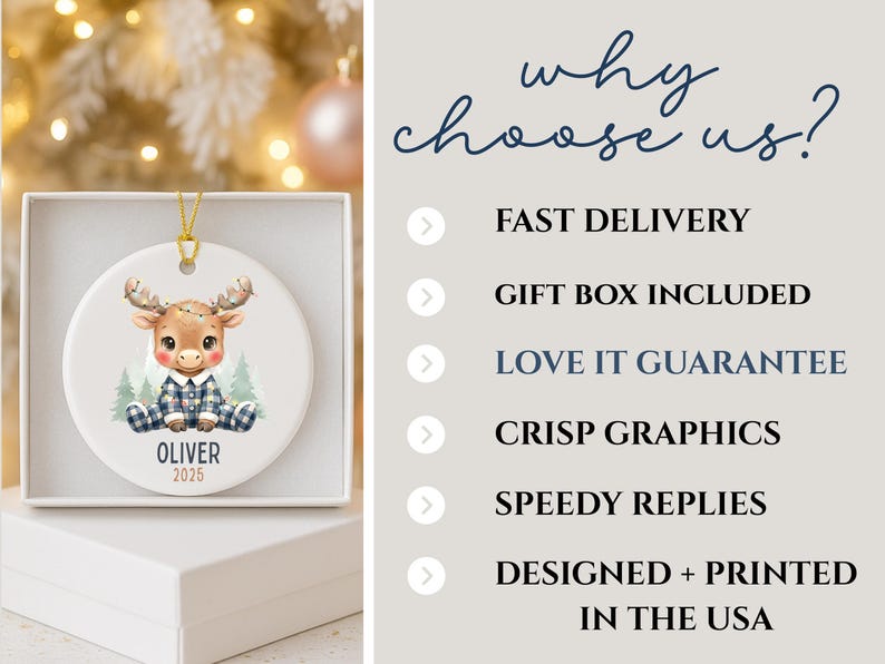 May include: A white ceramic Christmas ornament featuring a cartoon moose wearing a plaid outfit, sitting in front of pine trees. The ornament has a gold string for hanging and the name "Oliver" and the year "2025" are printed on it. The ornament is in a white gift box.