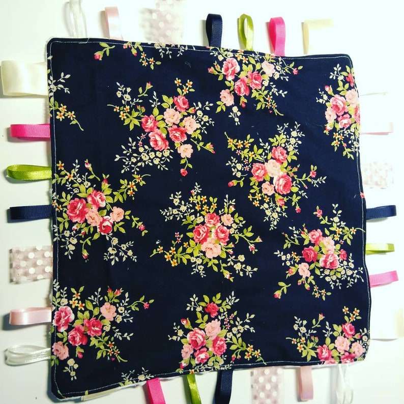 Navy floral taggy blanket
