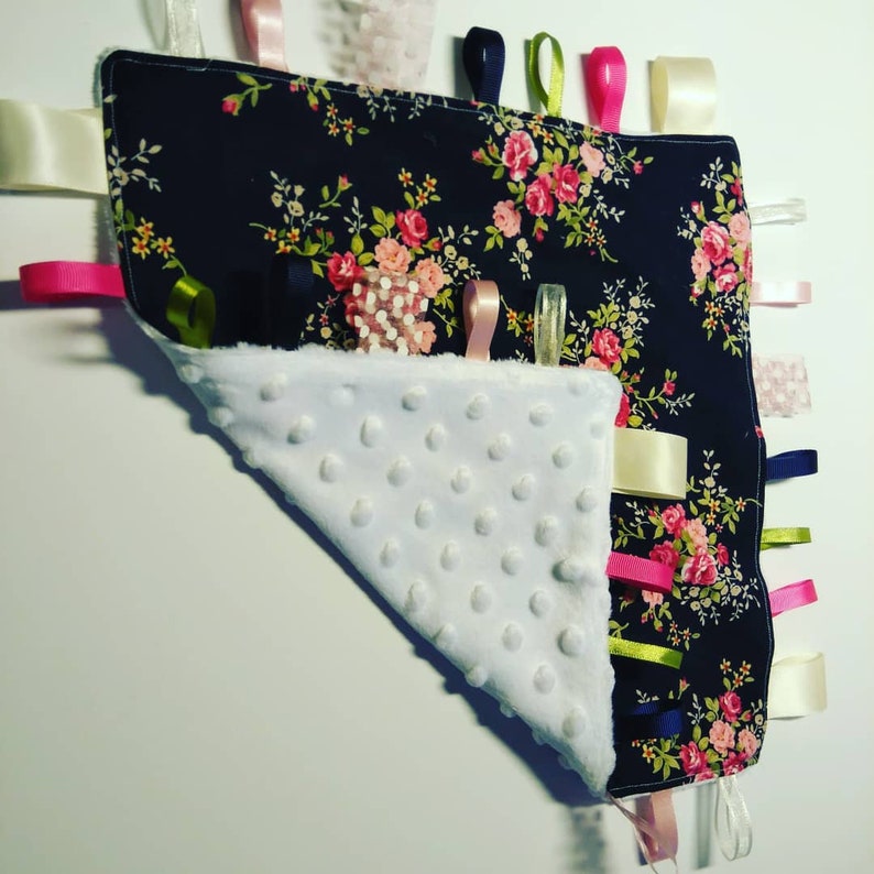 Navy floral taggy blanket