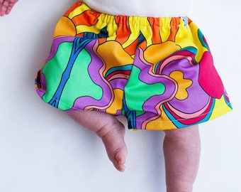 Children's unisex shorts. Sustainable, handmade, fun, festival, kids, baby, clothing. In Sunrise Print