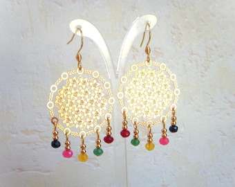 Earrings with filigree print, golden flower motif and multicolored dyed jade beads. Boho chic earring I