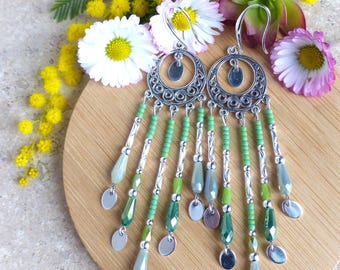 Long pair of silver and green glass earrings in boho style. Original gift for women.