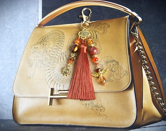 Bag charms, key ring with red jasper bead, glass and charms. Handmade bag charms with pompom. Original teacher gift.