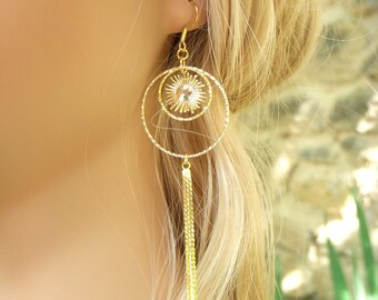 "Celestial" earrings, sun and star pendant and long gold chains. Original gold earrings.