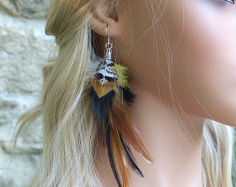Single feather earring. Unique earring. Lightweight feather earring. Hippie chic. Ethnic earring