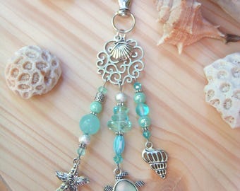 Turquoise blue and silver bag charm or key ring in glass and porcelain pearl with shell, turtle and starfish charm.