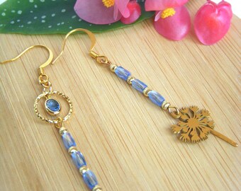 Asymmetrical "Angela" earrings with Lion's Tooth pendant. 2 colors to choose from. Original women's gift.