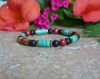 Bracelet in natural stone of red jasper, black agate, turquoise howlite heishi beads and long-lasting golden plated hematite.