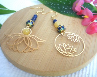 Asymmetrical "Mia" earrings with lotus-patterned brass pendants and a blue and gold cloisonné pearl.