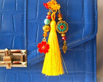 Bag charm or key ring with Tibetan bead and yellow pompom. Original gift for teacher, mom, friend.