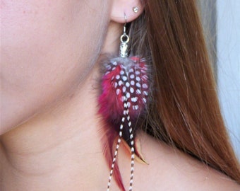 A feather earring. Original earring. Natural feather earring. Boho chic earring.