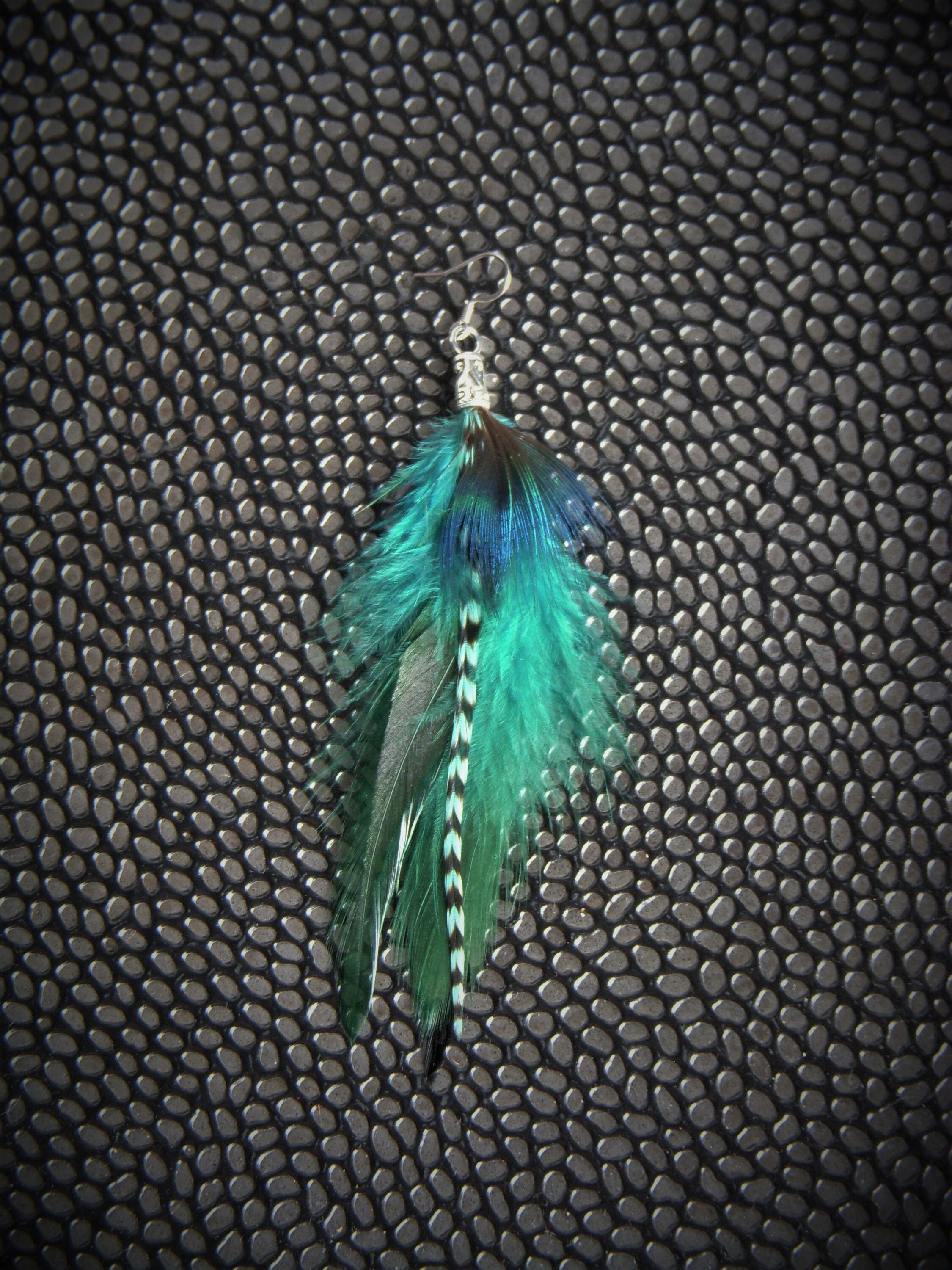 Single long feather earring. Original earring. Natural feather