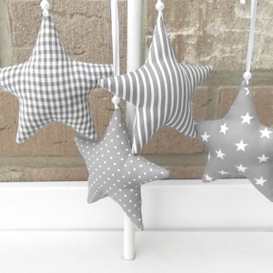Fabric stars in grey / Stars sewn from fabric