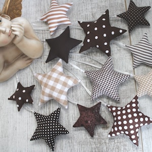 Fabric stars in beige or brown Stars made of fabric