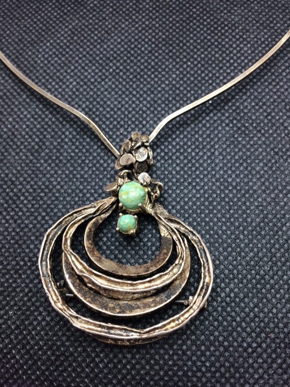 Brutalist silver necklace with blue stones
