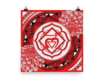 May include: A red and white poster featuring a chakra symbol at the center, surrounded by a mandala design and floral accents. The poster is held by two black binder clips. The artwork is a vibrant representation of spiritual themes.