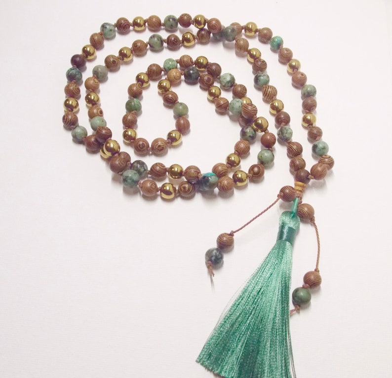 gold hematite African turquoise Wenge Wood Teal tassel African Wood and Water !