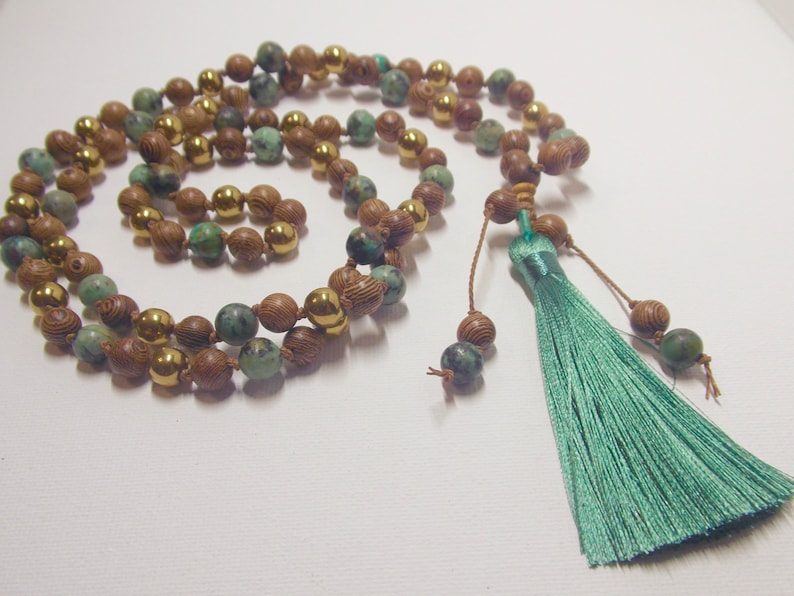 gold hematite African turquoise Wenge Wood Teal tassel African Wood and Water !