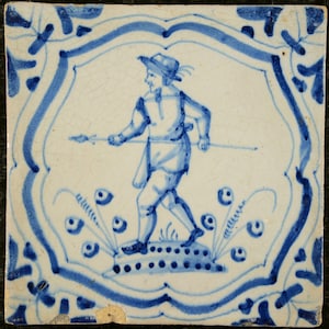 4 Antique Delft tiles with animals and a hunter Delft 1620 - 1650