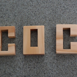 wood brain teaser burr puzzle, hand sanded, and hand finished for fun and stimulating play.