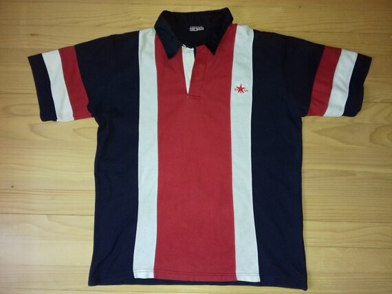 red white and blue puma shirt