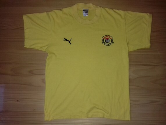 yellow vintage puma shirt