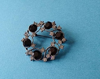 Black bead and rhinestone brooch c1950