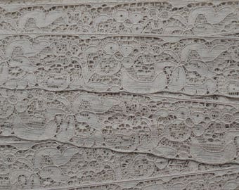 Very light old beige calais lace measuring 2.2cm wide and sold by the meter