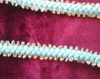 Wool and gold metal stripe measuring 1.5cm in turquoise blue and gold sold per metre