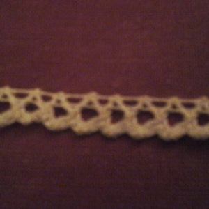 small lace finish color Ecru.