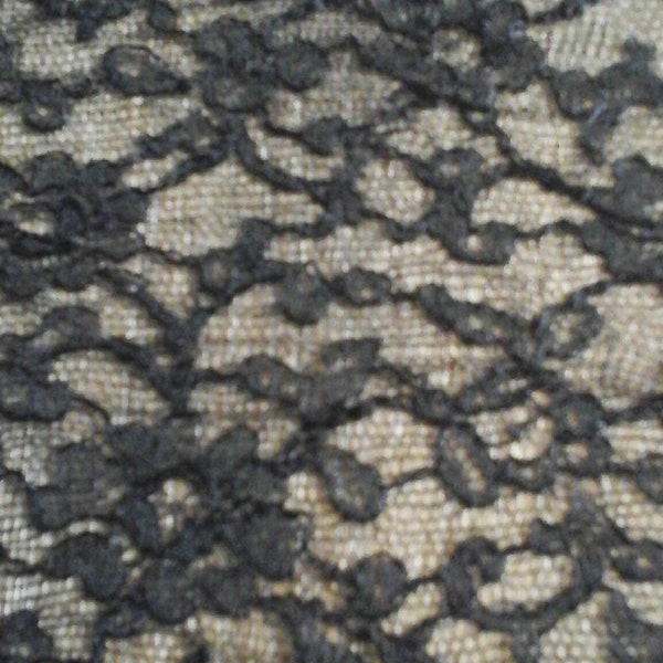 2m batch of Calais lace in black cotton measuring 23cm wide